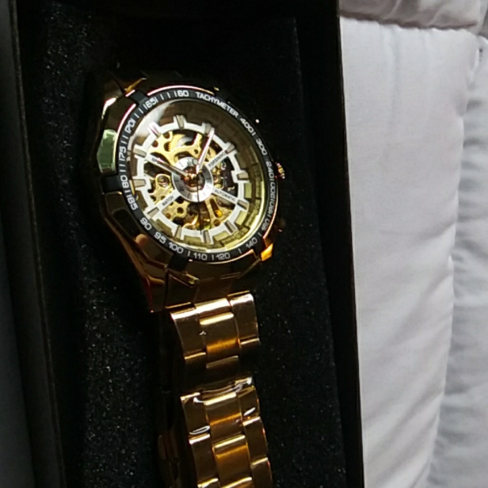 Gold plated skeleton watch